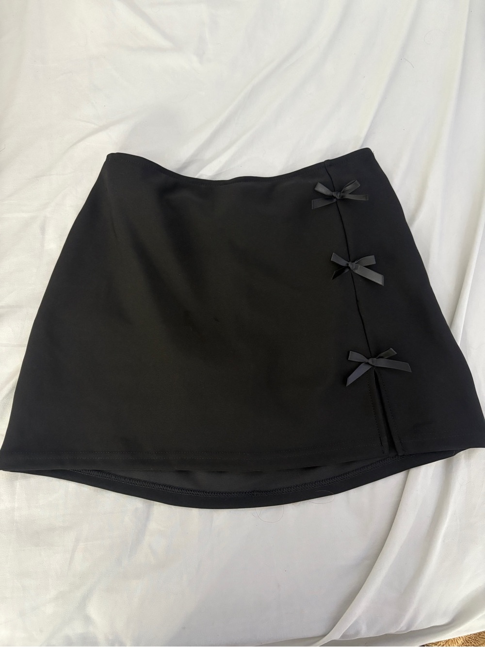 Black Mini Skirt with Side Bow Details